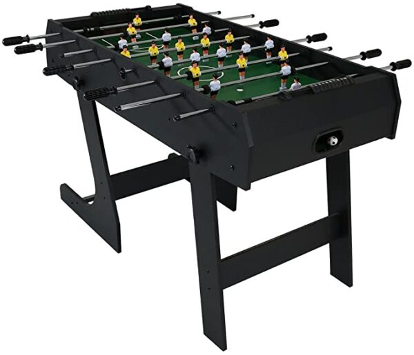 A black foosball table with a green playing field. The table has a foldable stand and includes foosball players and rods.