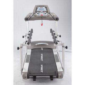 Spirit Fitness Treadmill with a large console, safety rails on both sides, and a wide running belt. The treadmill has a sturdy frame and appears to be designed for commercial use.