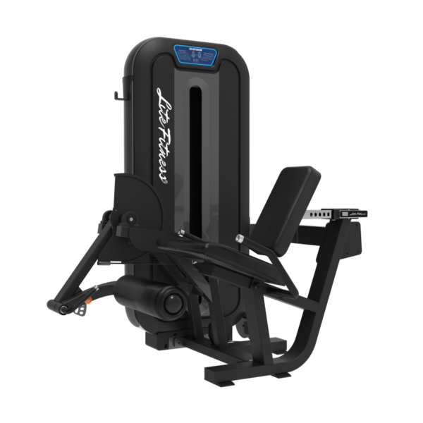 Lifespan Prone Leg Curl Machine: A black leg curl machine with a padded seat and adjustable weight stack. The machine has a sturdy steel frame and is designed for targeting the hamstrings. The word "Lifespan" is printed on the front of the machine.