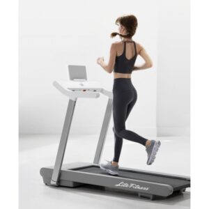 A black motorized treadmill with a digital display, handles for support, and a wide running belt. The treadmill has a "Lite Fitness".