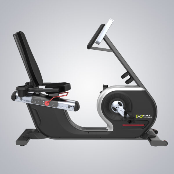 A black recumbent exercise bike with a gray console, a comfortable seat, and adjustable handlebars. The bike has wheels for easy movement and a red accent color.