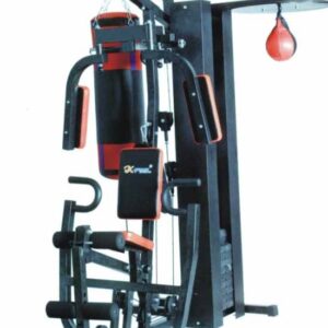 A multi-gym home workout station with a punching bag, weight plates, and various exercise attachments. The station has a black frame and red accents.