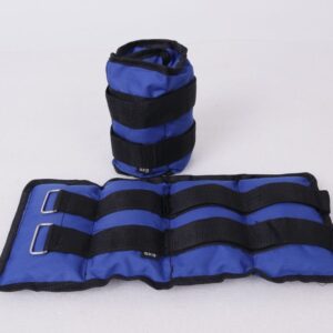 Two blue ankle weights on a white background. The ankle weights have black straps and buckles. One ankle weight is rolled up, while the other is lying flat.